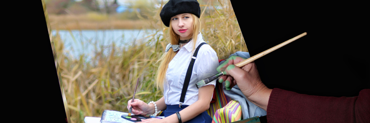 Mano di pittore che dipinge una foto di ragazza