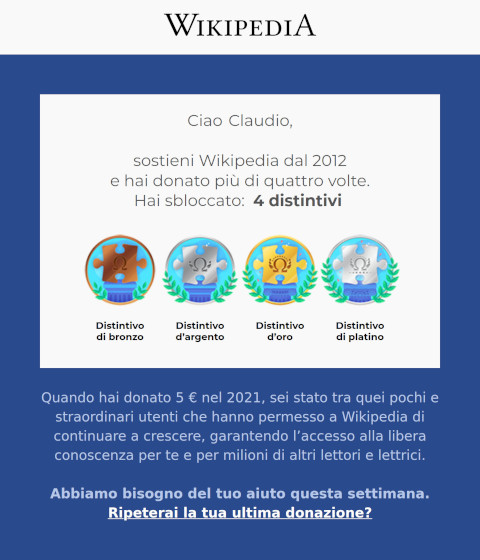 I quattro distintivi che mi sono guadagnato (dal bronzo al platino) e l'introduzione testuale dell'email